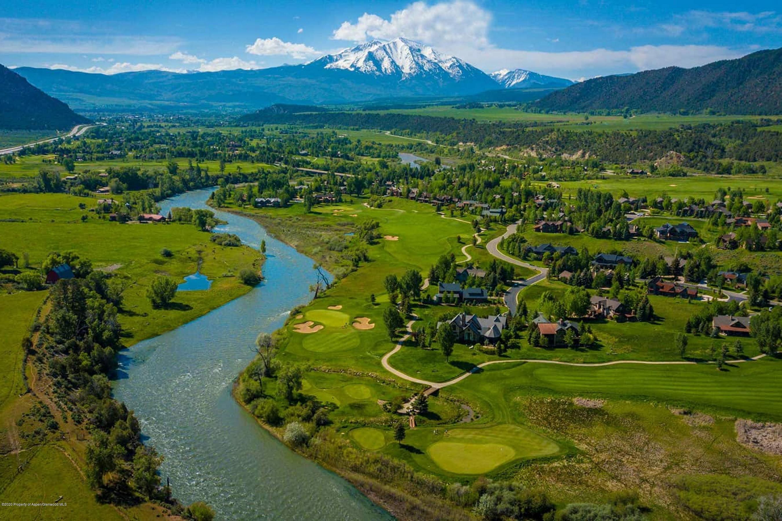 57 Diamond A Ranch Road, Unit WEST Carbondale, CO 81623 - Photo 12 of 13 a view of a lake with a mountain in the background