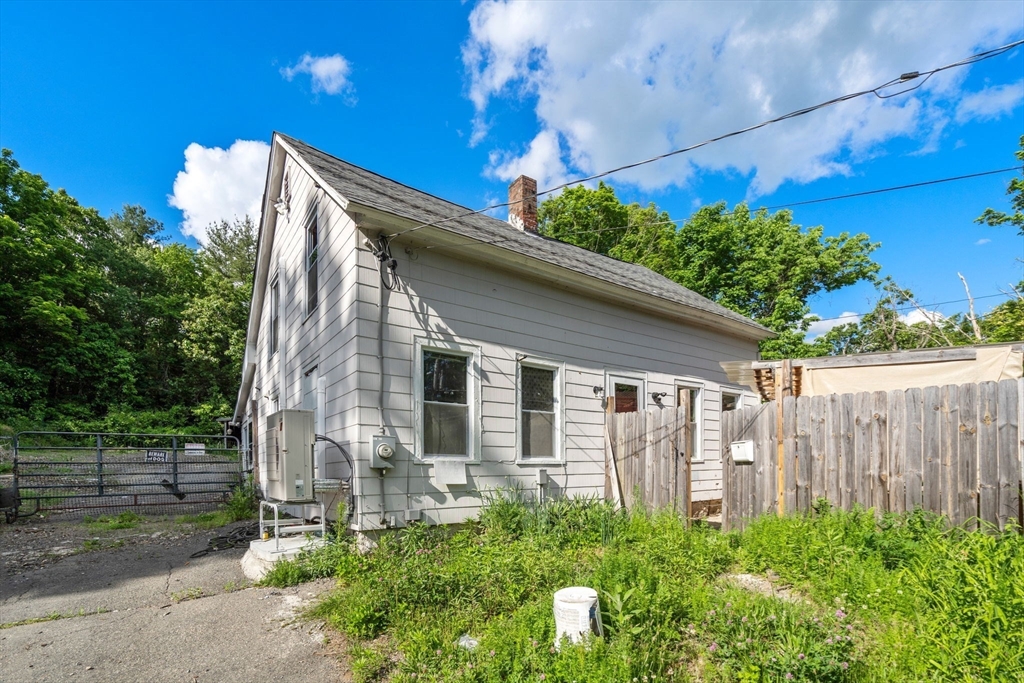 190 Ware Road Warren, MA 01092 - Photo 1 of 17 a backyard of a house with lots of green space