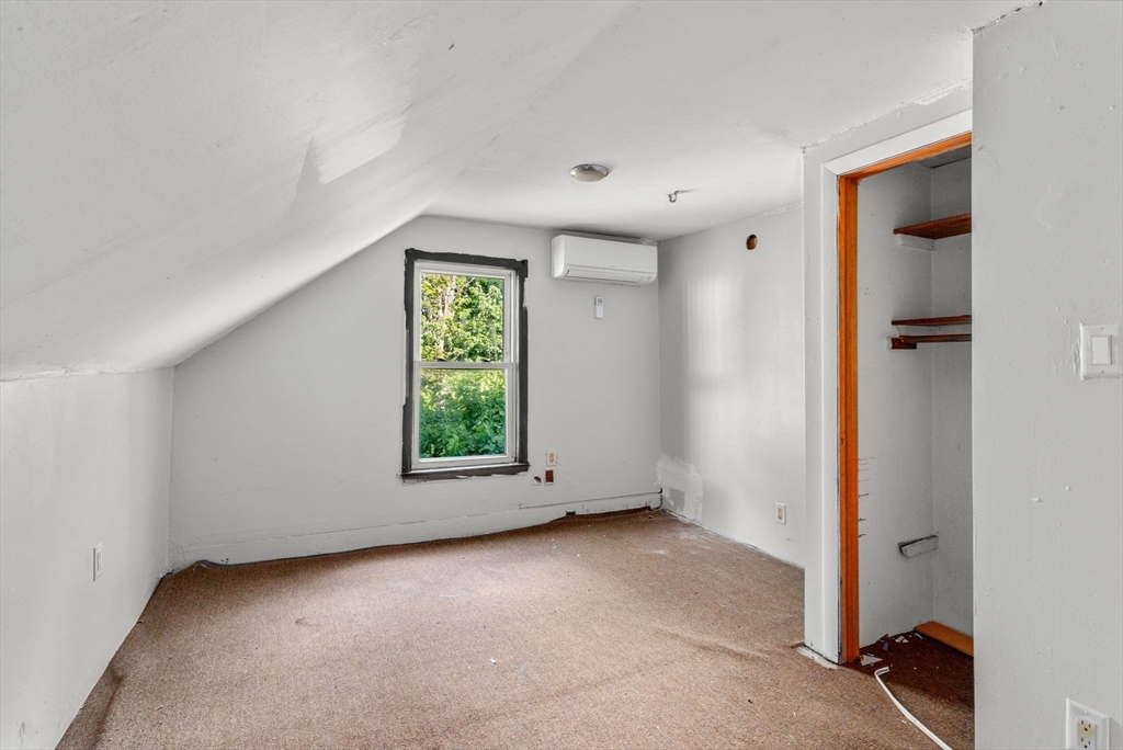 190 Ware Road Warren, MA 01092 - Photo 12 of 17 an empty room with windows and closet