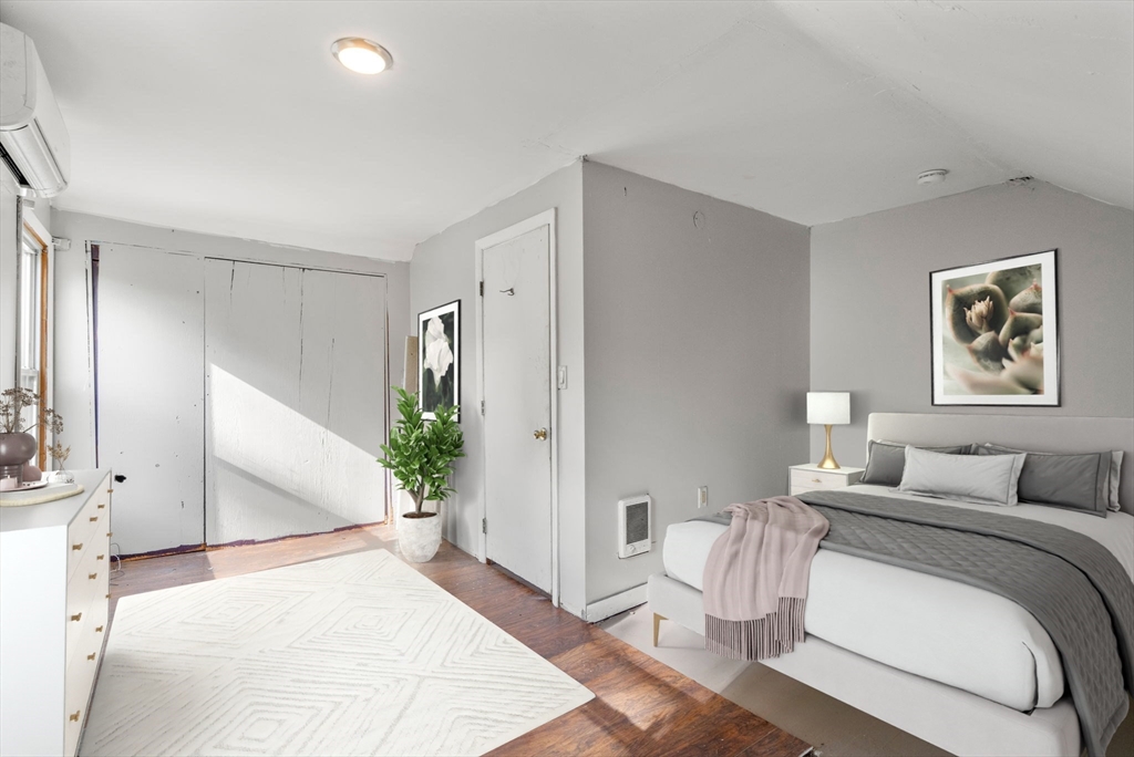 190 Ware Road Warren, MA 01092 - Photo 9 of 17 a bedroom with a large white bed and a couch