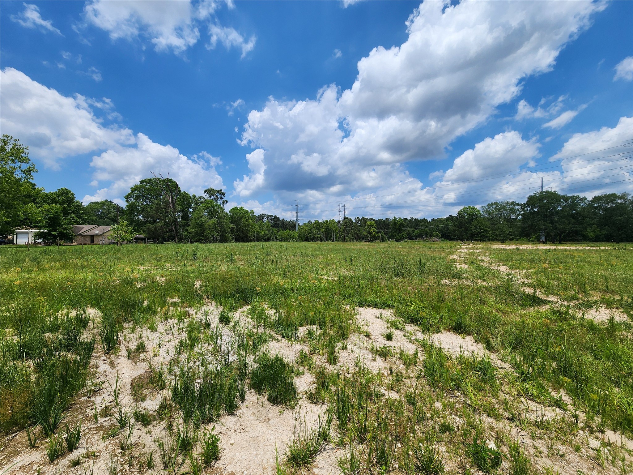 15015 Calhoun Road Conroe, TX 77302 - Photo 2 of 31 a view of a lake