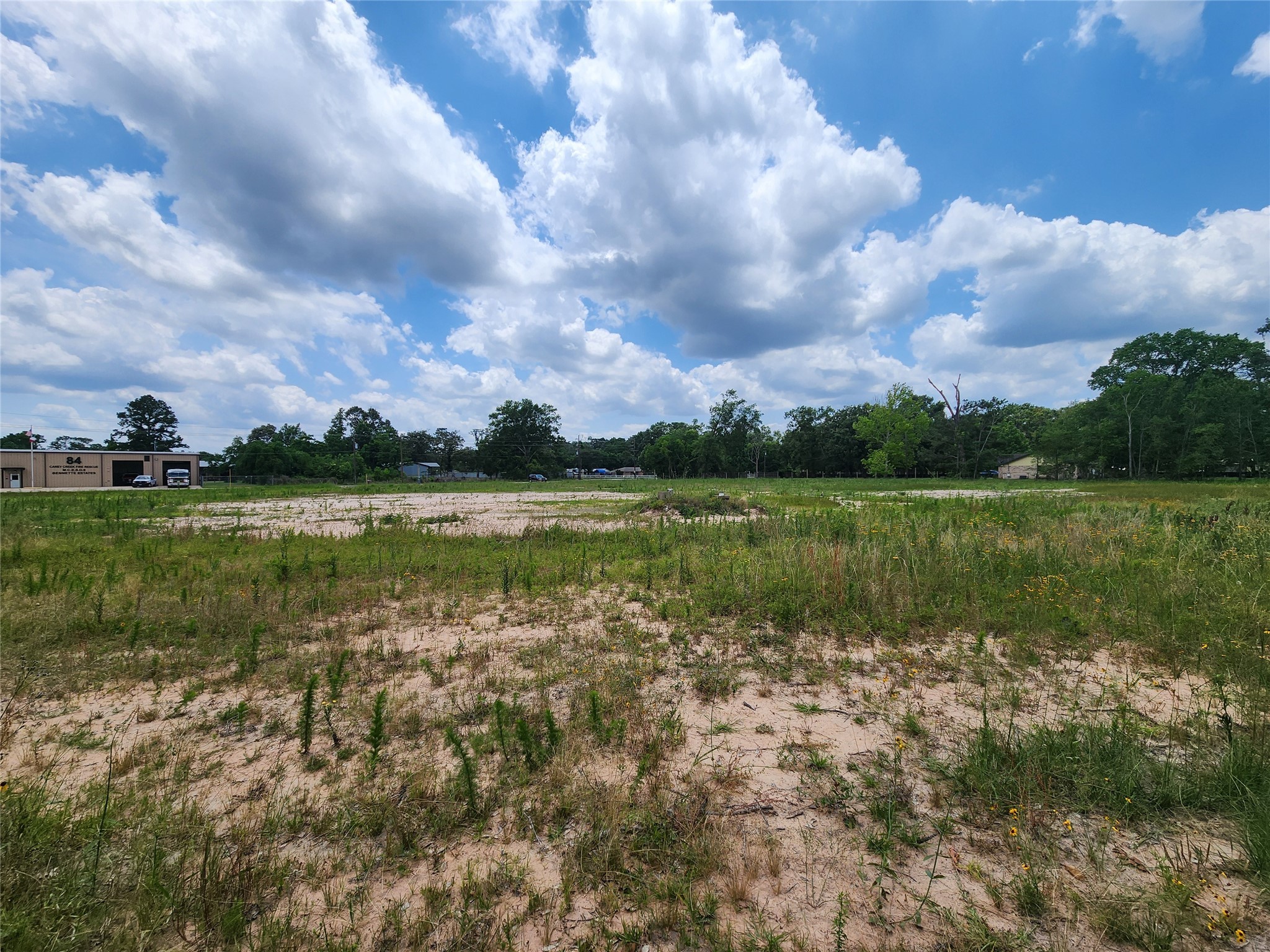 15015 Calhoun Road Conroe, TX 77302 - Photo 9 of 31 a view of a lake with a big yard