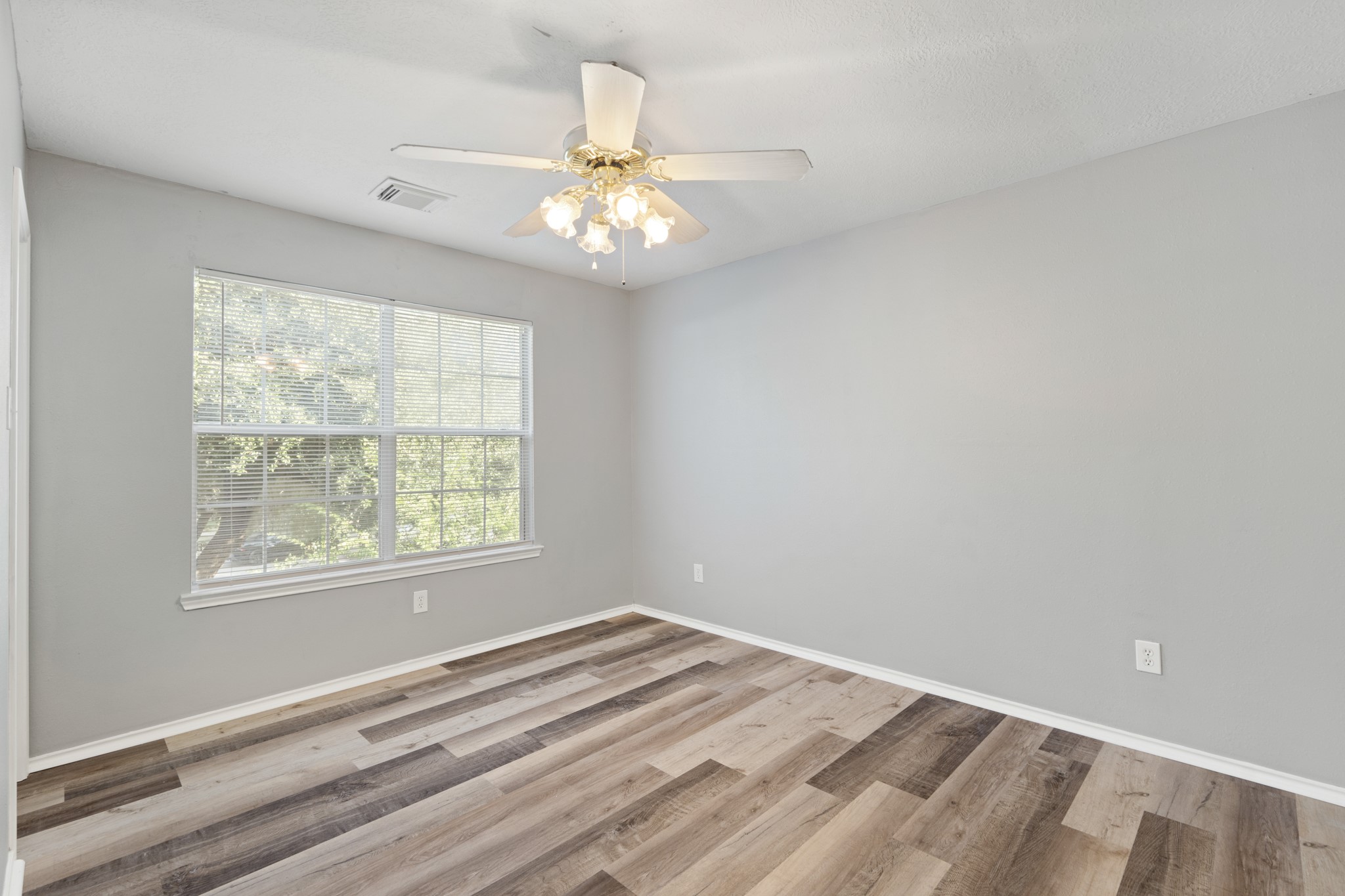 20807 Carsen Spring Court Katy, TX 77449 - Photo 21 of 31 a view of an empty room with a window