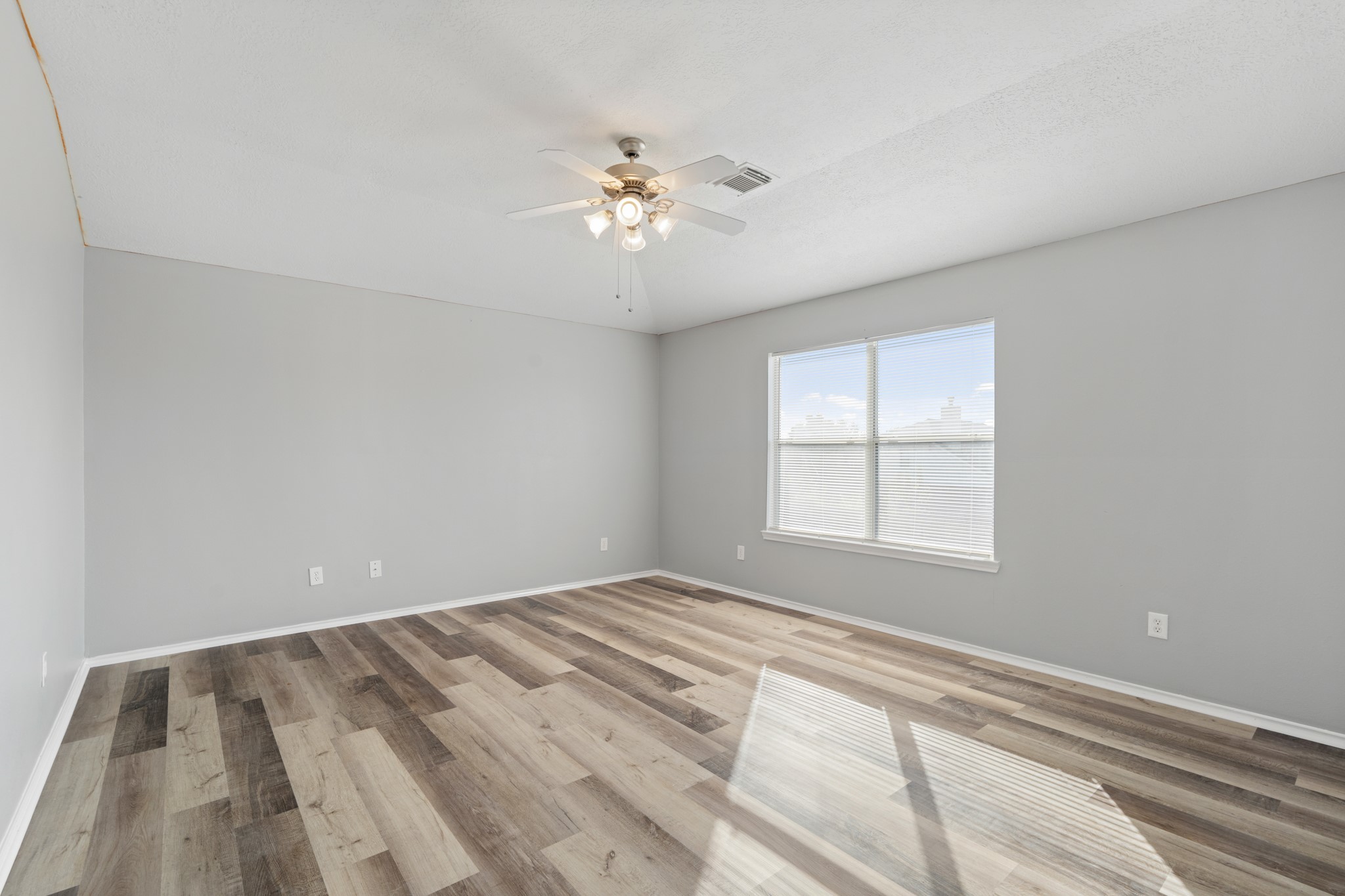 20807 Carsen Spring Court Katy, TX 77449 - Photo 22 of 31 a view of an empty room with a window