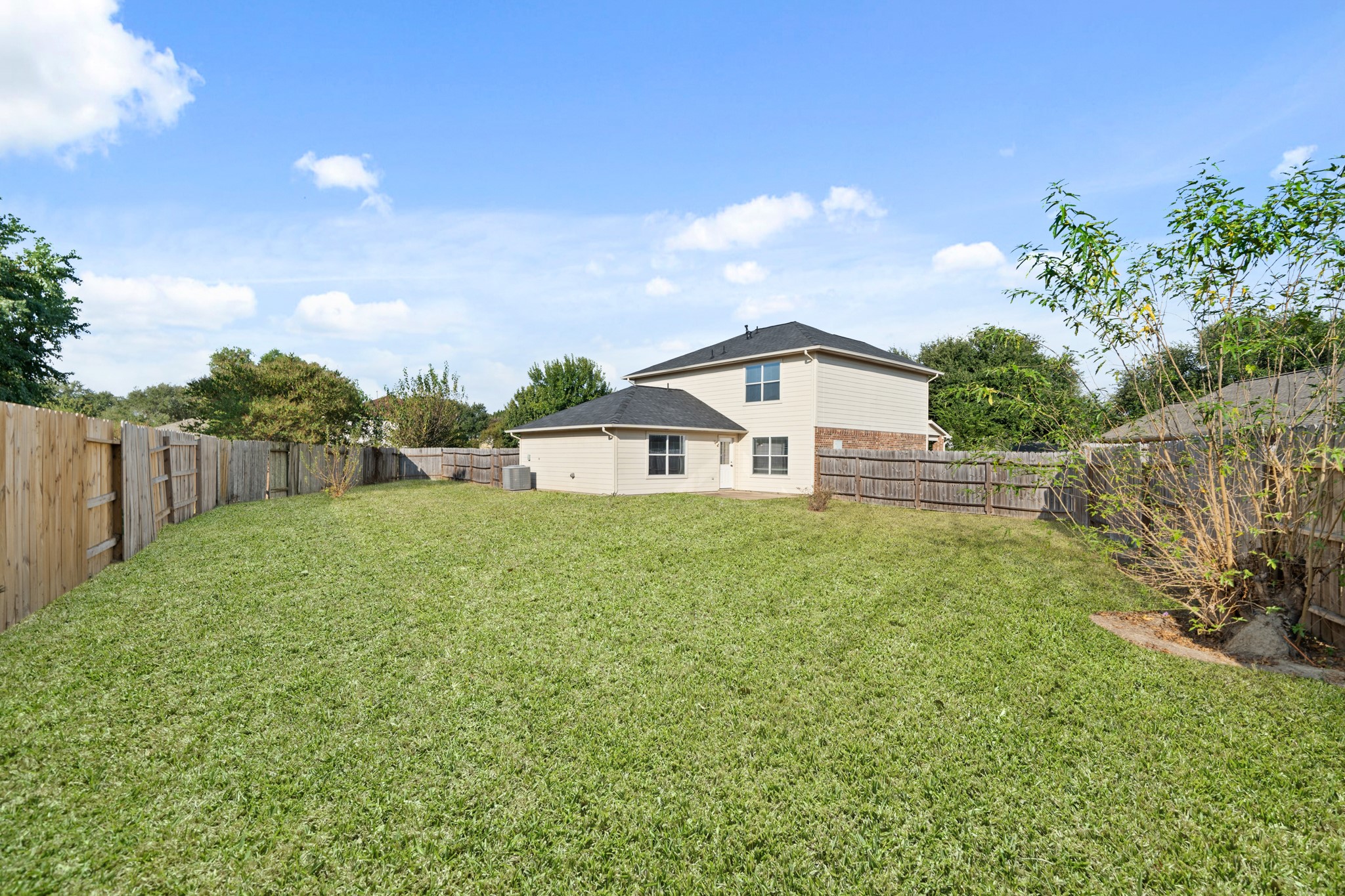 20807 Carsen Spring Court Katy, TX 77449 - Photo 27 of 31 a view of a house with backyard and garden