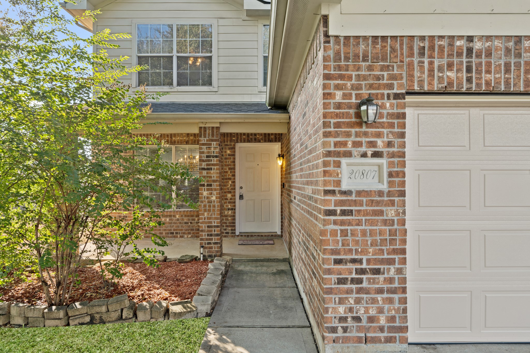 20807 Carsen Spring Court Katy, TX 77449 - Photo 4 of 31 front view of a brick house