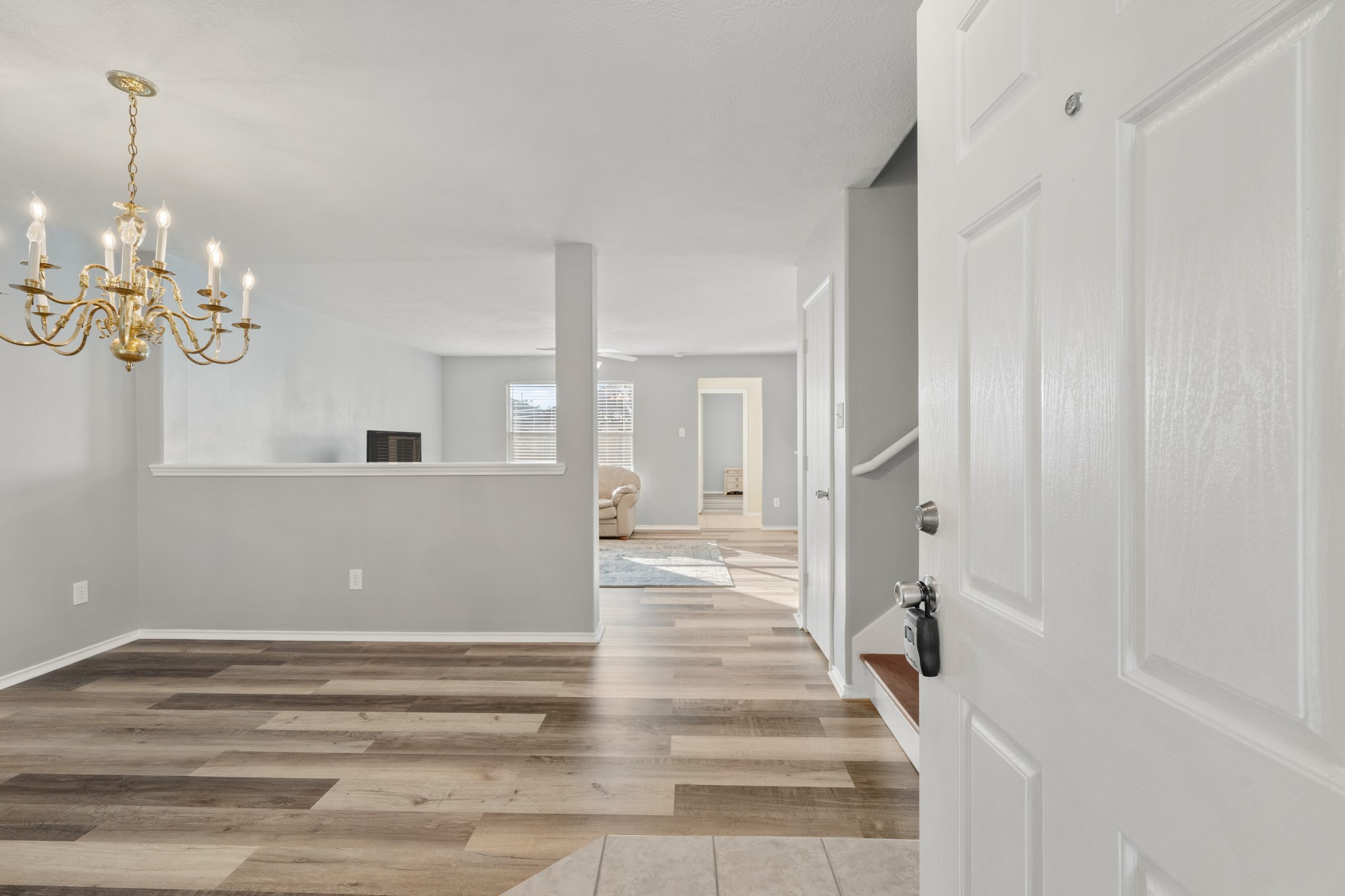 20807 Carsen Spring Court Katy, TX 77449 - Photo 5 of 31 a view of a room with wooden floor and staircase