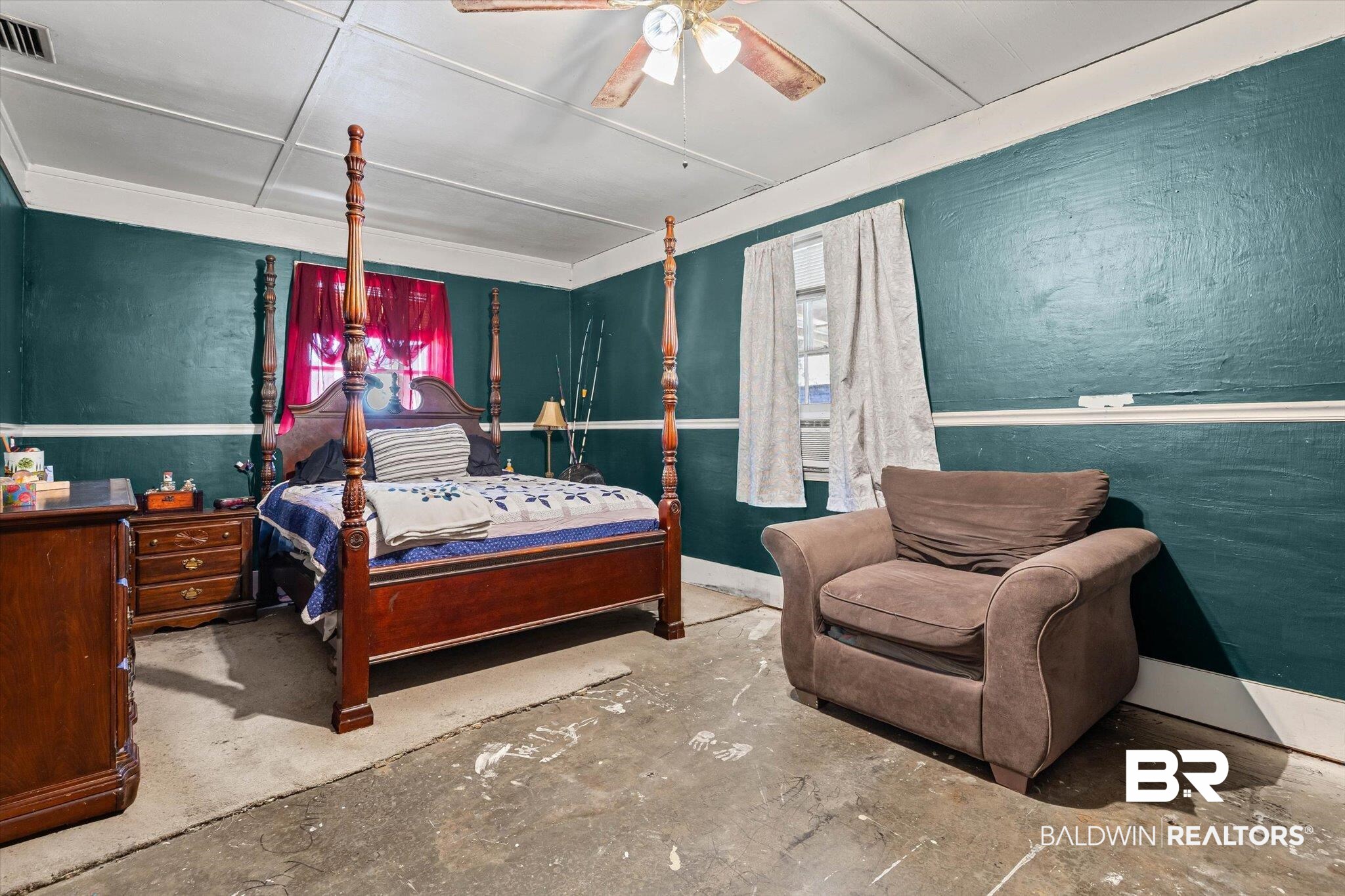 7991 Three Notch Road Theodore, AL 36582 - Photo 9 of 22 Bedroom featuring concrete floors and a ceiling fan
