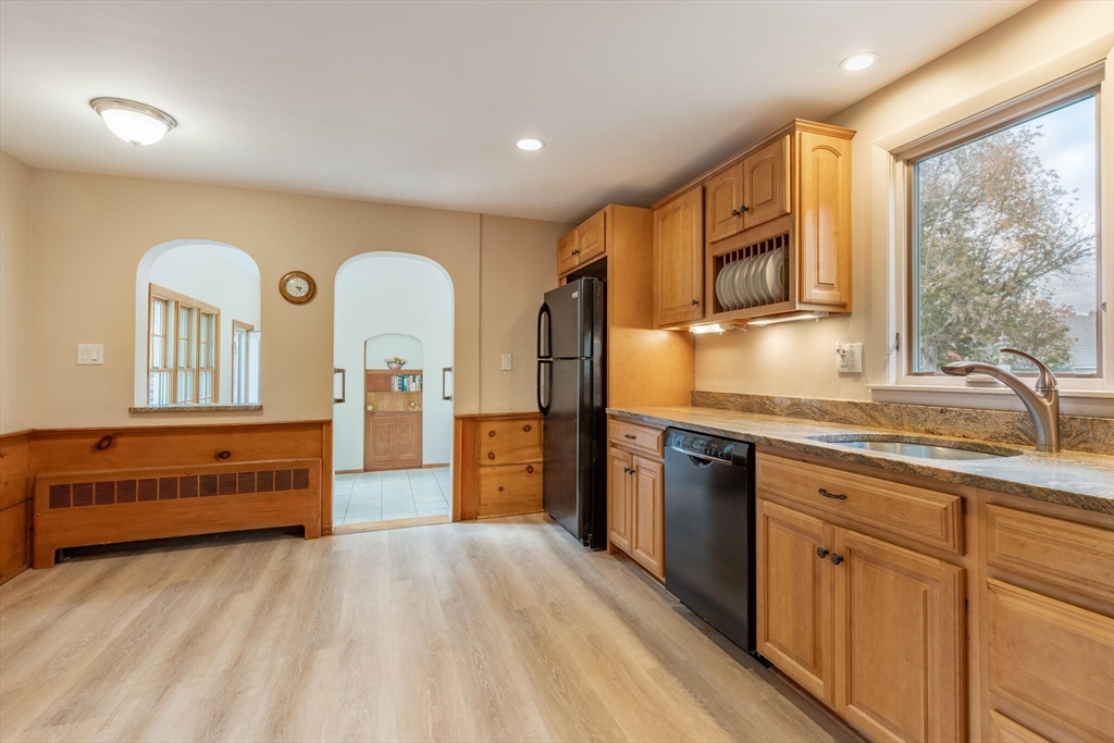6 Longview Road Chelmsford, MA 01824 - Photo 12 of 40 a kitchen with stainless steel appliances granite countertop a refrigerator and stove