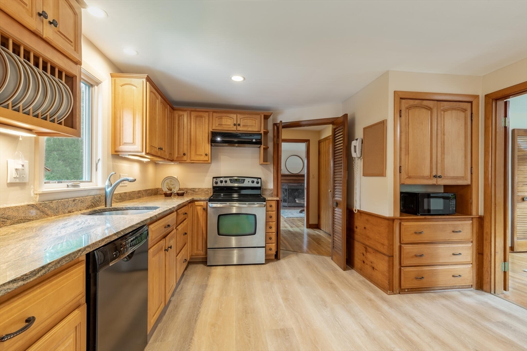 6 Longview Road Chelmsford, MA 01824 - Photo 15 of 40 a kitchen with a refrigerator stove and sink