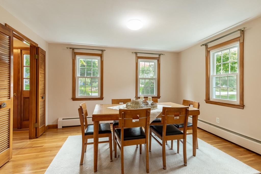 6 Longview Road Chelmsford, MA 01824 - Photo 17 of 40 a view of a dining room with furniture and wooden floor