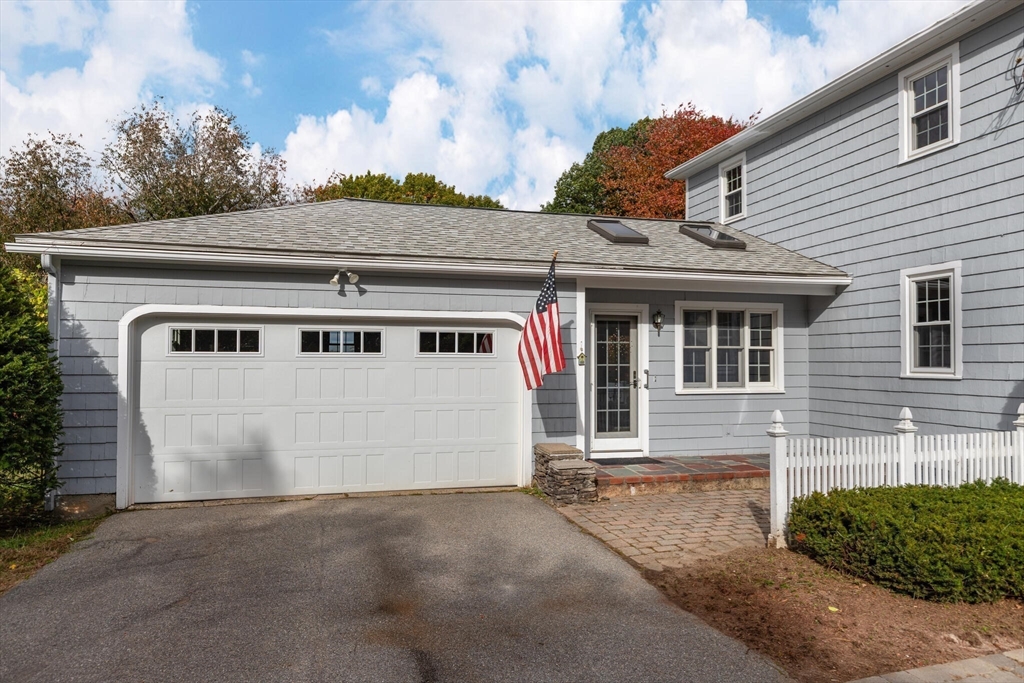 6 Longview Road Chelmsford, MA 01824 - Photo 20 of 40 a view of a white house with large windows