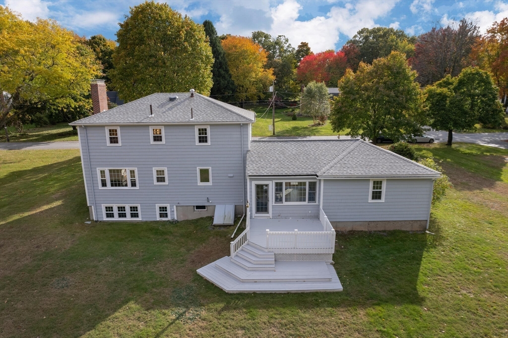 6 Longview Road Chelmsford, MA 01824 - Photo 37 of 40 a front view of a house with a yard