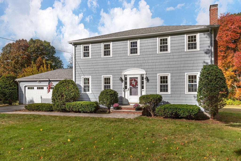 6 Longview Road Chelmsford, MA 01824 - Photo 4 of 40 a front view of a house with a yard