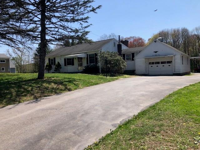 104 Srader Grove Road Freeport, PA 16229 - Photo 3 of 32 a front view of a house with a yard and garage