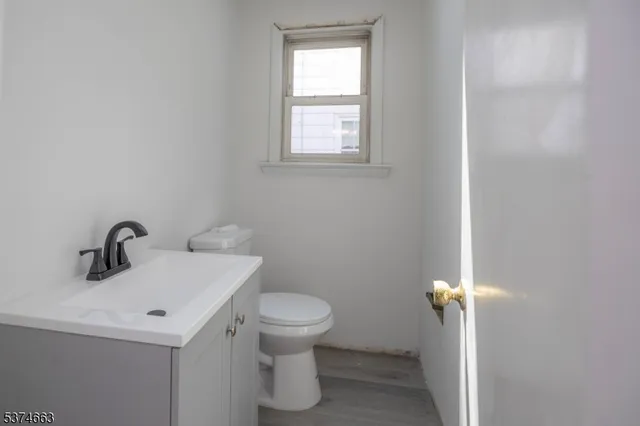 a bathroom with a sink and a toilet