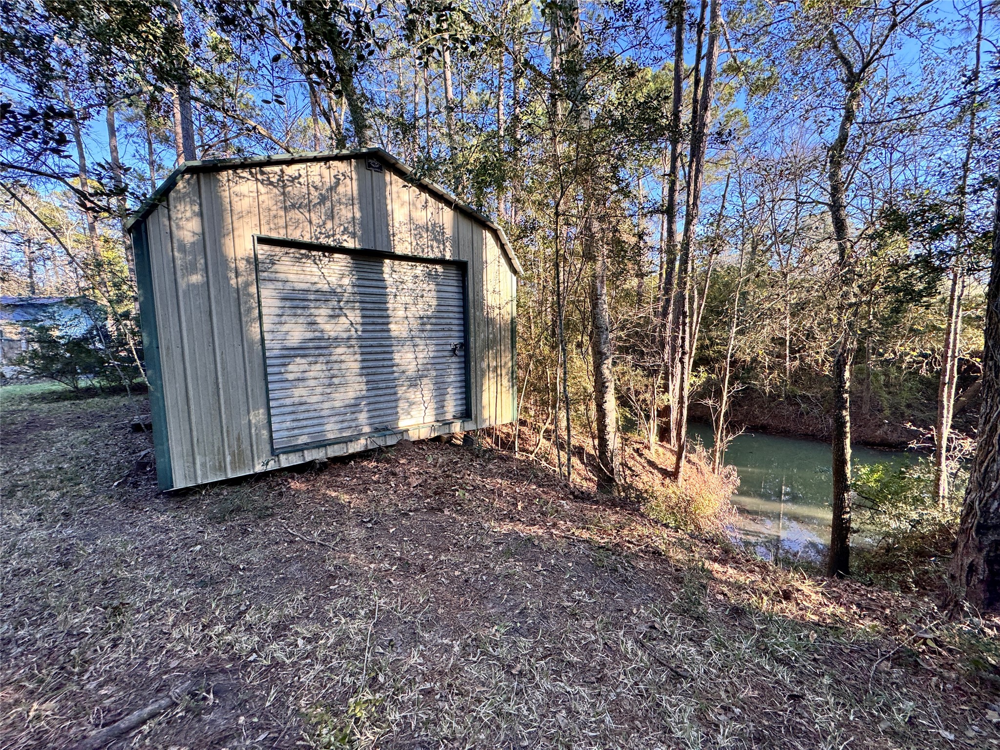 Lot 98 Barbil Lane Huffman, TX 77336 - Photo 12 of 14 a backyard of a house with lots of green space