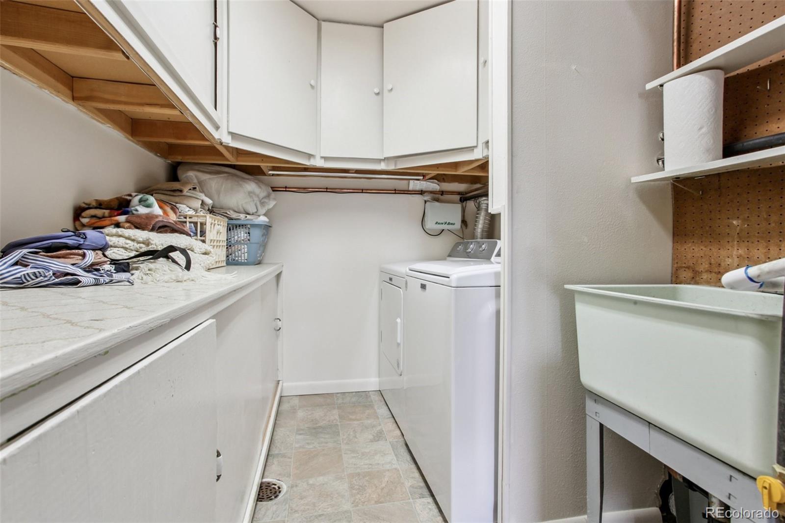 6689 South Delaware Street Littleton, CO 80120 - Photo 24 of 25 a view of storage and utility room