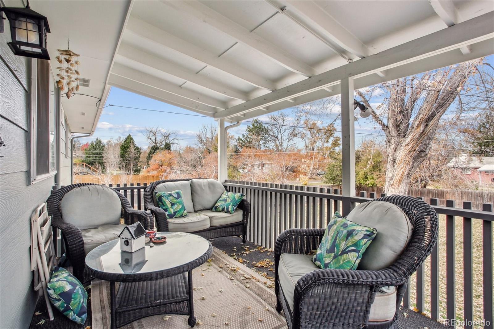 6689 South Delaware Street Littleton, CO 80120 - Photo 25 of 25 a living room with furniture and a window