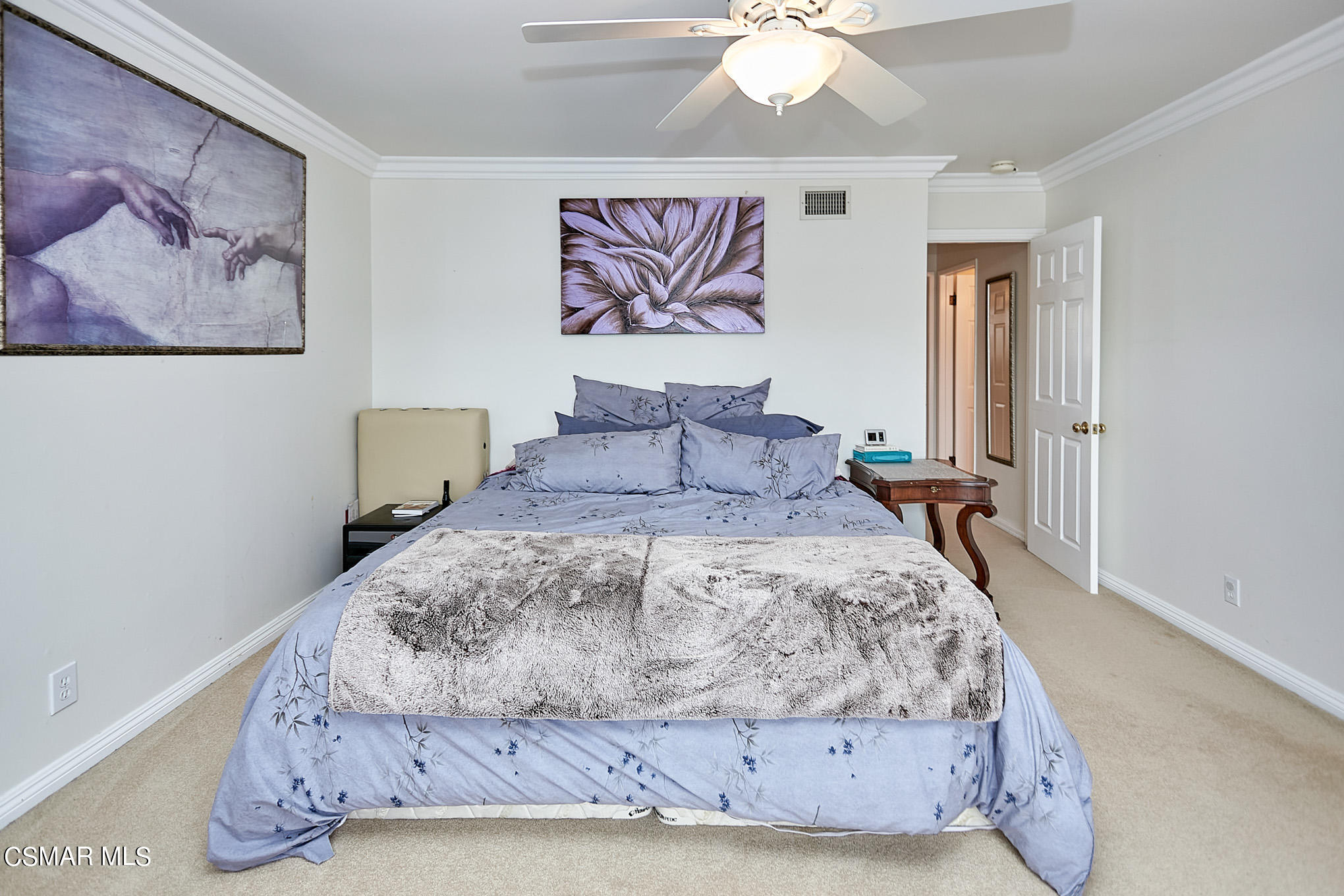 786 Erringer Road Simi Valley, CA 93065 - Photo 14 of 33 a bedroom with a bed and a painting on the wall