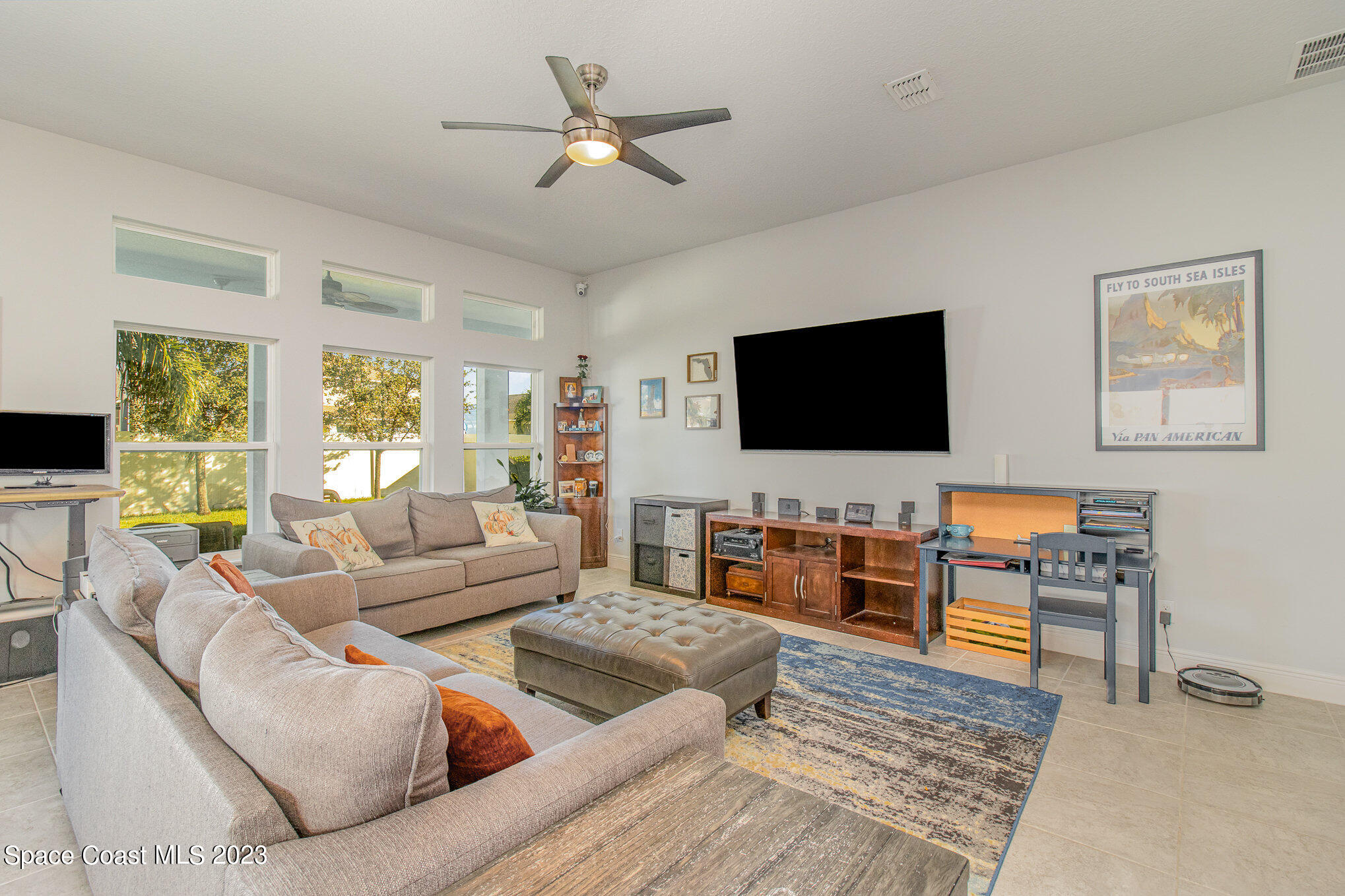 4362 Ruthann Circle Melbourne, FL 32934 - Photo 5 of 25 GREATROOM WITH TRANSOME WINDOWS