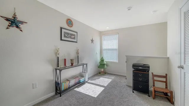 a view of a hallway with workspace