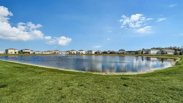 a view of a lake with a city
