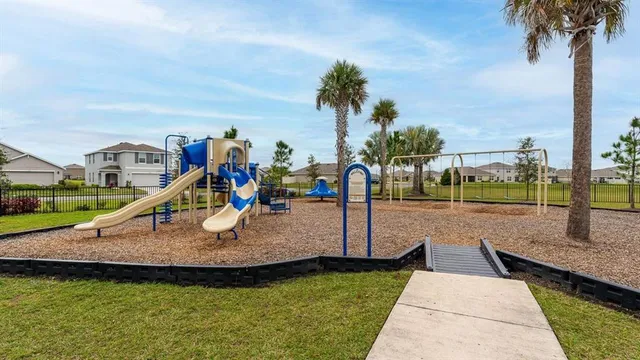 a view of a park with swings