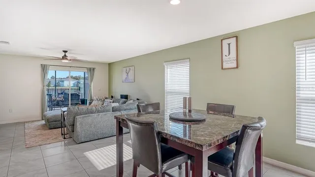 a view of a dining room with furniture