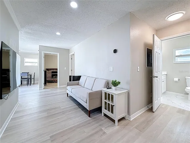 a en suite bathroom with a sink and a mirror