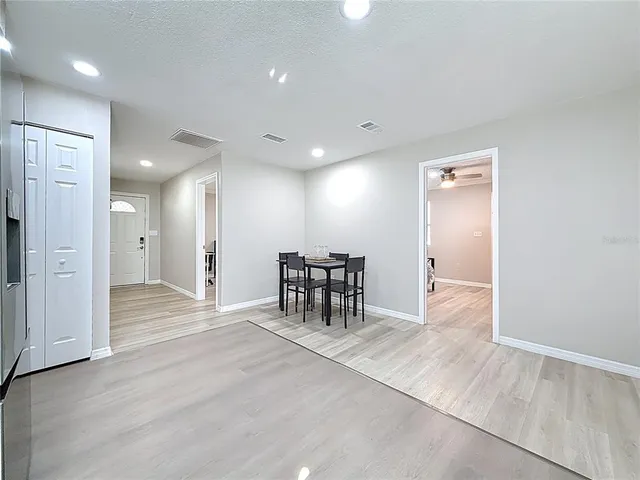 a view of a livingroom with furniture and wooden floor