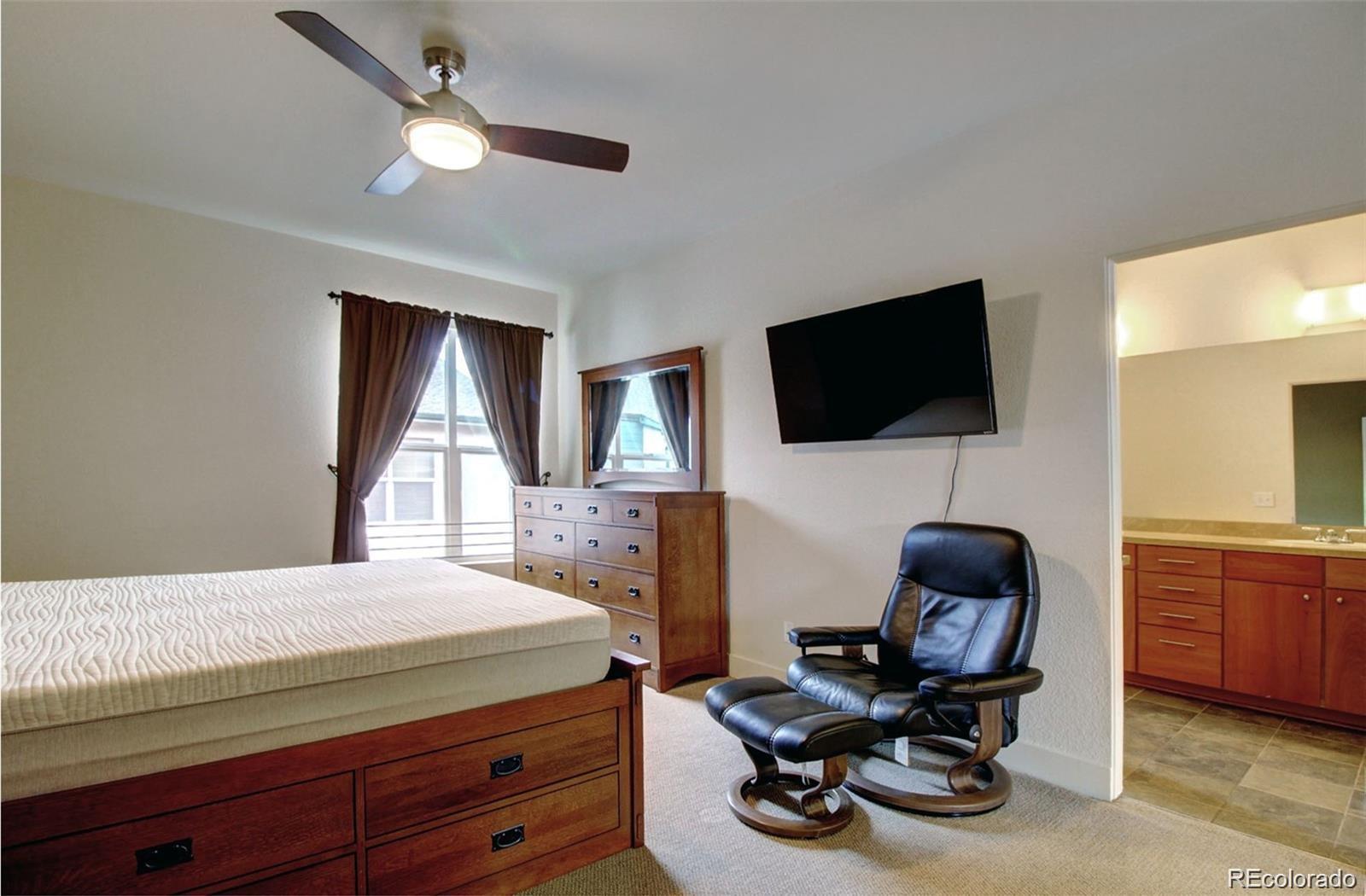 2360 South Wheeling Circle Aurora, CO 80014 - Photo 15 of 26 a bedroom with a workspace