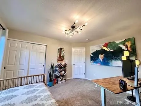 a view of livingroom with furniture and a couch