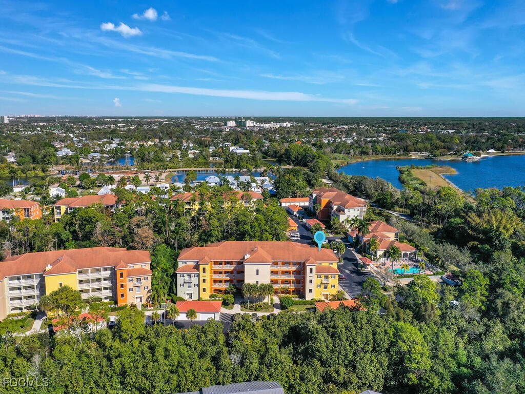 4500 Botanical Pl Circle, Unit 4 Naples, FL 34112 - Photo 2 of 43 an aerial view of residential houses with outdoor space and ocean