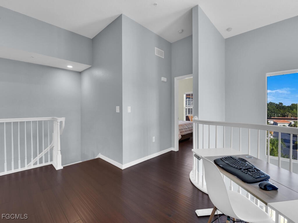 4500 Botanical Pl Circle, Unit 4 Naples, FL 34112 - Photo 21 of 43 a view of a sink and wooden floor in a room