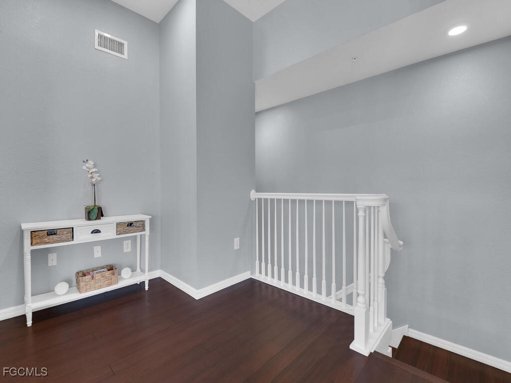 4500 Botanical Pl Circle, Unit 4 Naples, FL 34112 - Photo 22 of 43 wooden floor in a room
