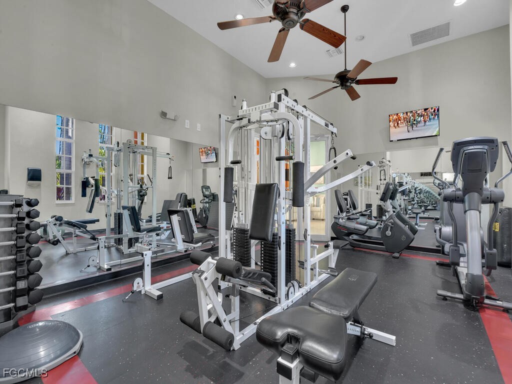 4500 Botanical Pl Circle, Unit 4 Naples, FL 34112 - Photo 38 of 43 a view of a room with gym equipment