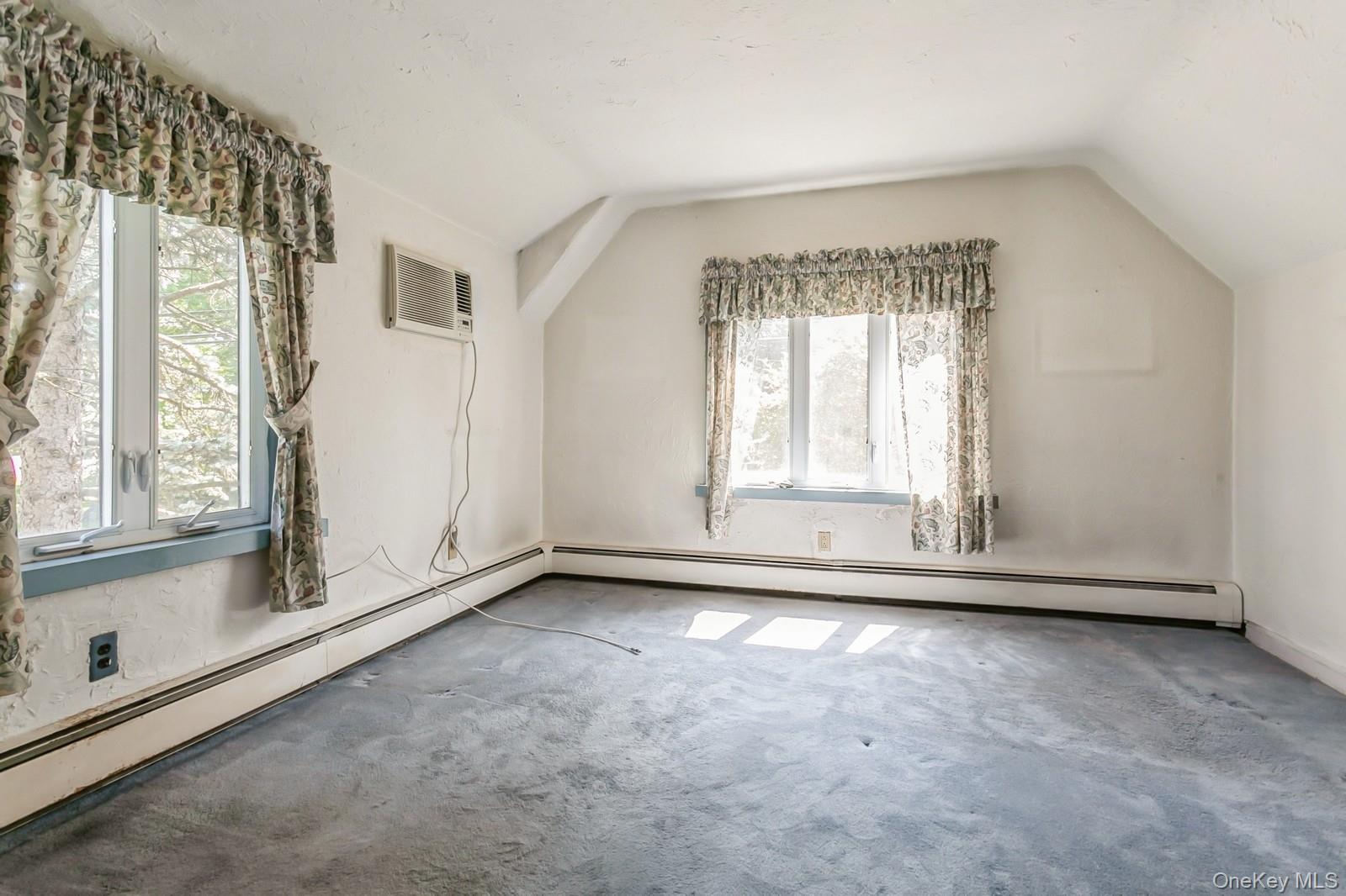 444 Milton Road Rye, NY 10580 - Photo 13 of 23 a view of an empty room with a window