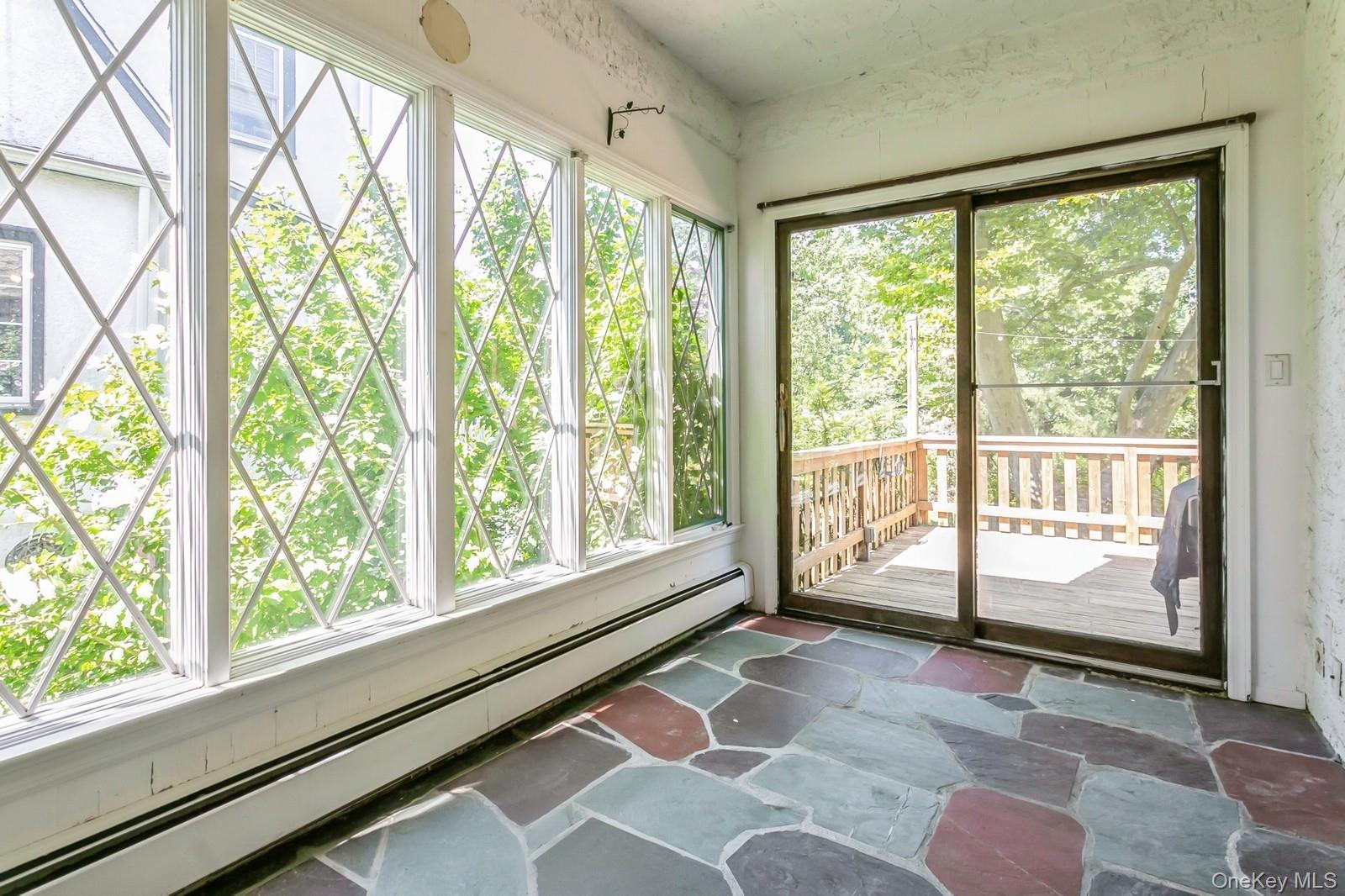 444 Milton Road Rye, NY 10580 - Photo 14 of 23 a view of a room with a large window