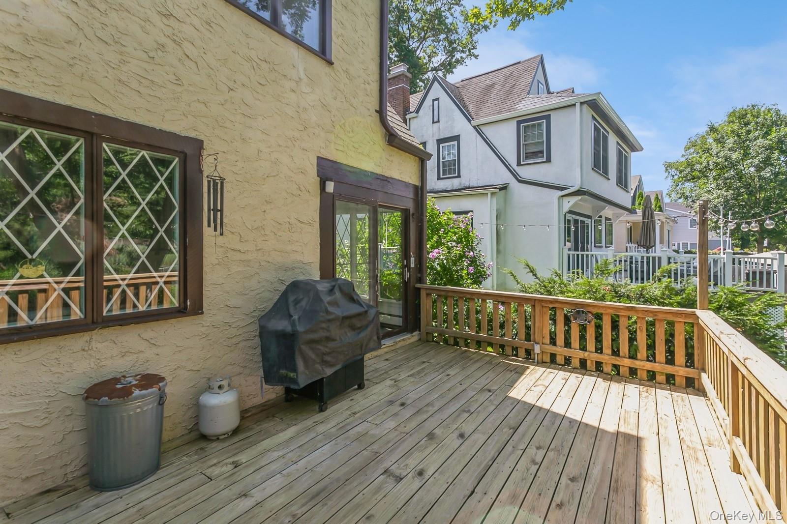 444 Milton Road Rye, NY 10580 - Photo 17 of 23 a view of a deck with wooden floor and seating space