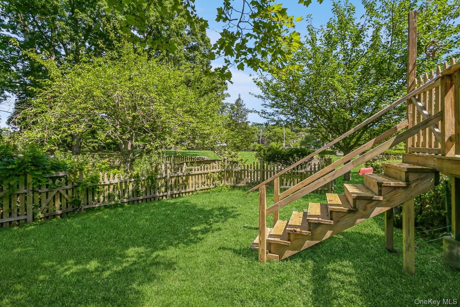 444 Milton Road Rye, NY 10580 - Photo 22 of 23 a view of a house with a yard