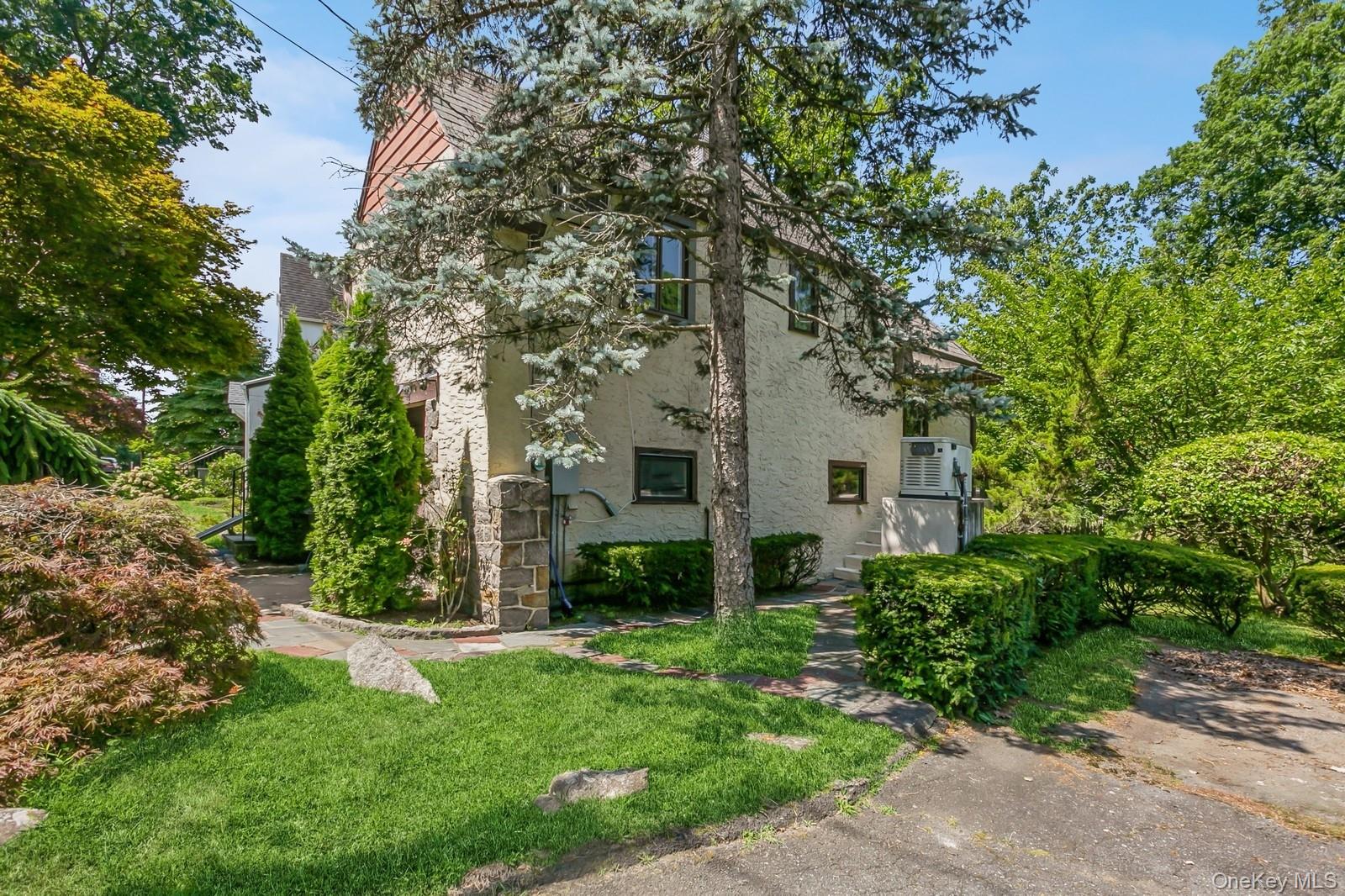 444 Milton Road Rye, NY 10580 - Photo 23 of 23 a view of a yard in front of house