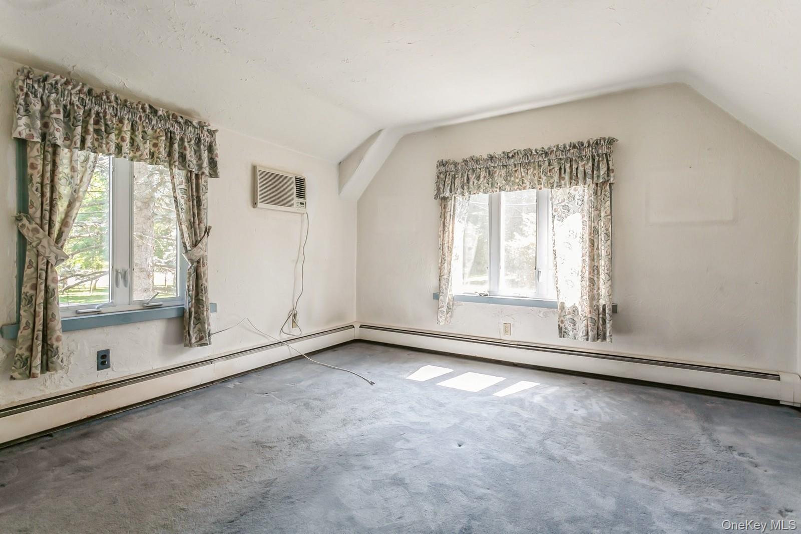 444 Milton Road Rye, NY 10580 - Photo 10 of 23 an empty room with windows