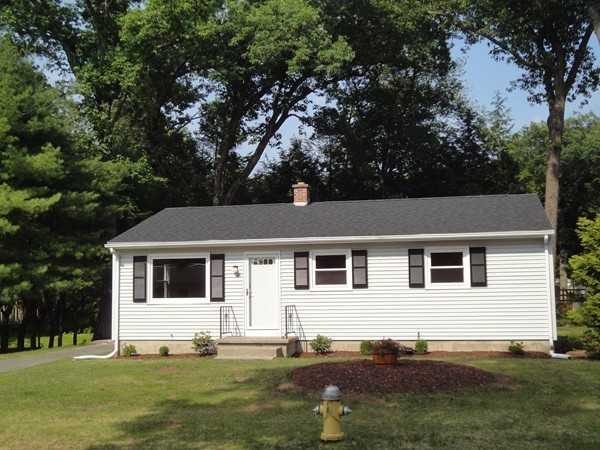 60 Jeanne Marie Street Springfield, MA 01129 - Photo 16 of 20 a front view of a house with a garden