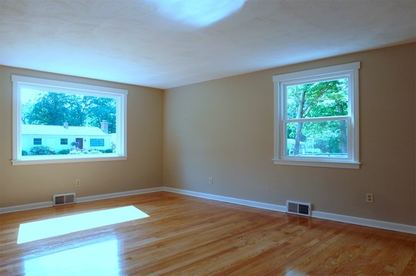 60 Jeanne Marie Street Springfield, MA 01129 - Photo 5 of 20 a view of an empty room with wooden floor and a window