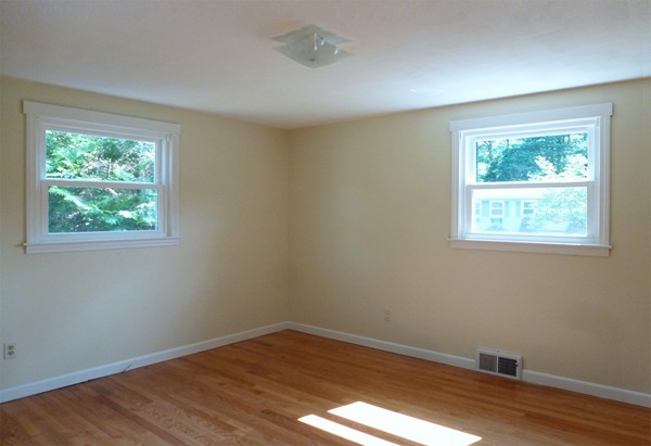 60 Jeanne Marie Street Springfield, MA 01129 - Photo 9 of 20 a view of an empty room with wooden floor and a window