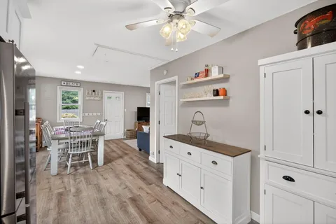 a view of kitchen with breakfast area
