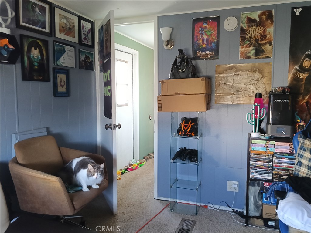 2100 Soapmine Road, Unit 44 Barstow, CA 92311 - Photo 14 of 17 a room with furniture and cabinets