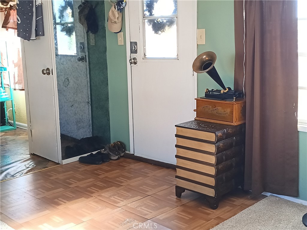 2100 Soapmine Road, Unit 44 Barstow, CA 92311 - Photo 6 of 17 a view of entryway and hall with wooden floor