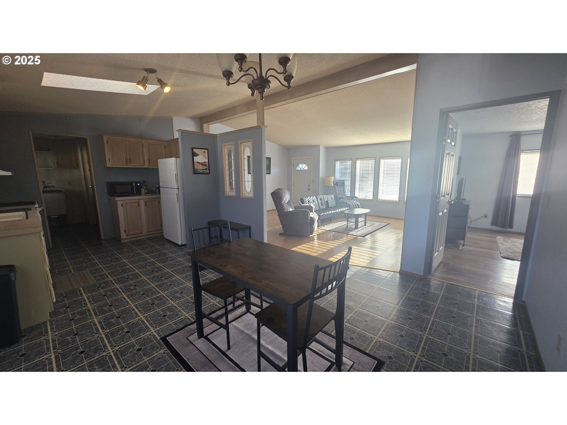 1500 South Columbus Avenue, Unit 38 Goldendale, WA 98620 - Photo 13 of 30 a kitchen with a table and chairs